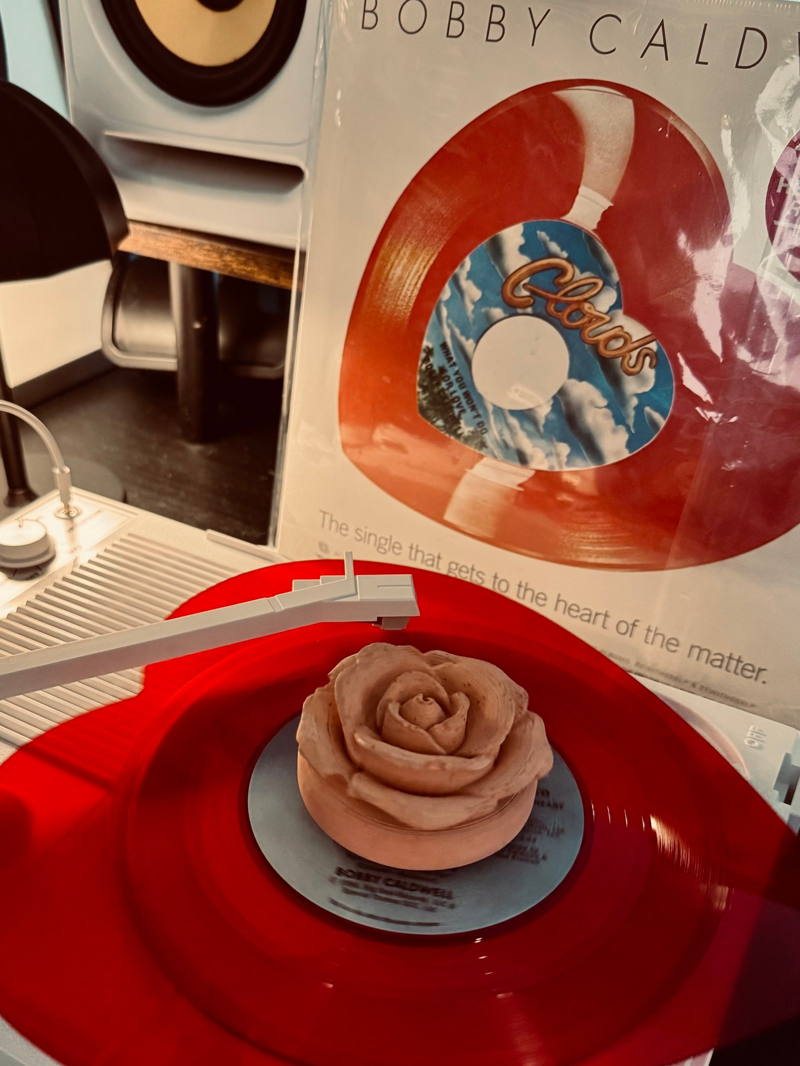 Rose adapter on a red vinyl record — a unique personalized design