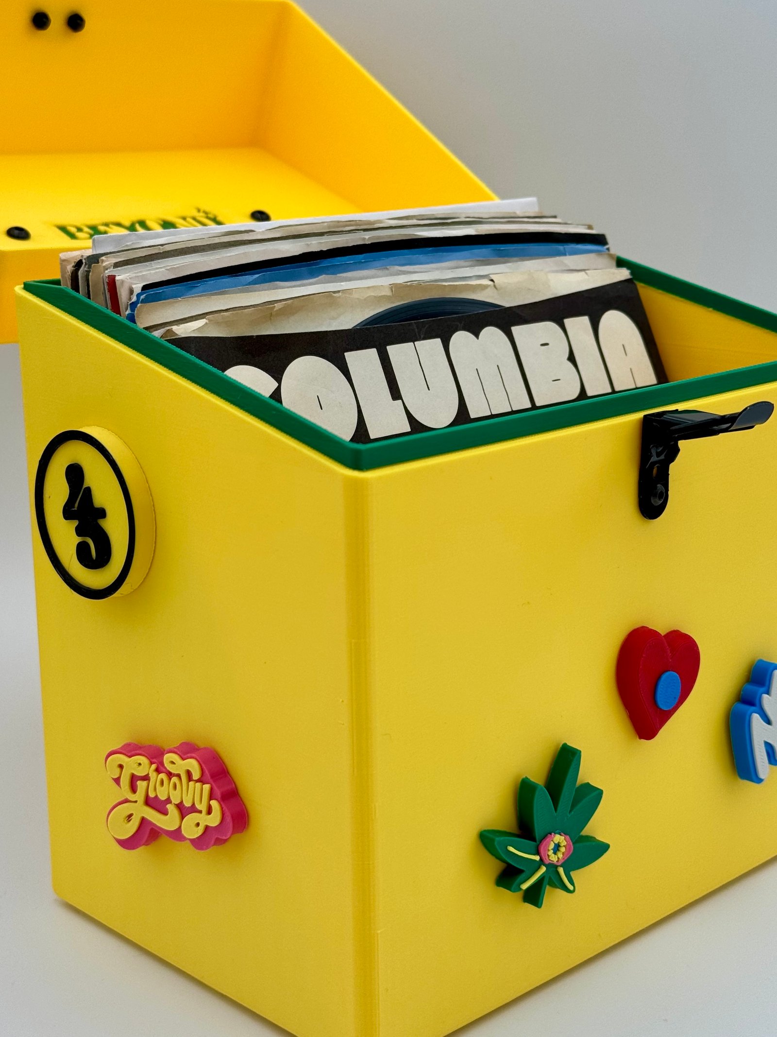 Premium yellow 7-inch storage box with Columbia record inside and custom Jibbitz charms